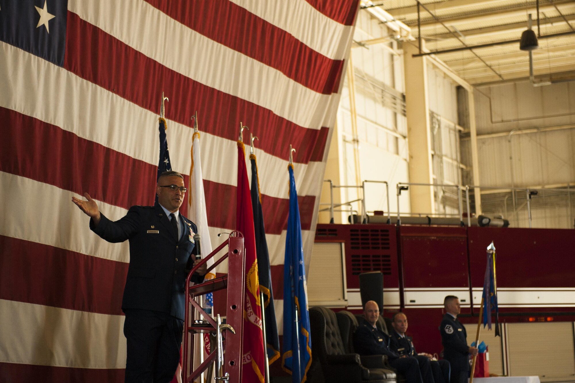 U.S. Air Force Col. Alejandro Ganster, 17th Training Group Commander, speaks during the 312th Training Squadron change of command ceremony at the Louis F. Garland Department of Defense Fire Academy High Bay, July 10, 2017. The 312th TRS welcomed Lt. Col. Scott D. Cline as the new Commander. (U.S. Air Force photo by Senior Airman Scott Jackson/released)