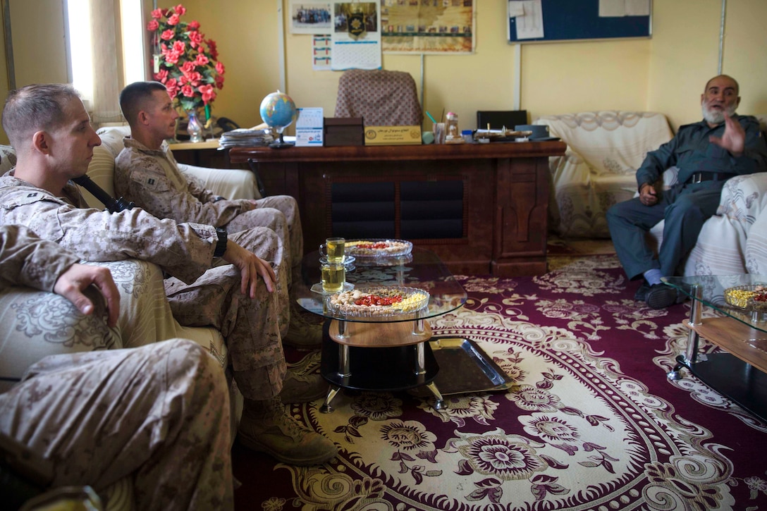 U.S. Marines meet with an Afghan leader during a train, advise and assist mission at the Helmand Provincial Police Headquarters in Lashkar Gah, Afghanistan, July 9, 2017. Marine Corps photo by Sgt. Justin T. Updegraff