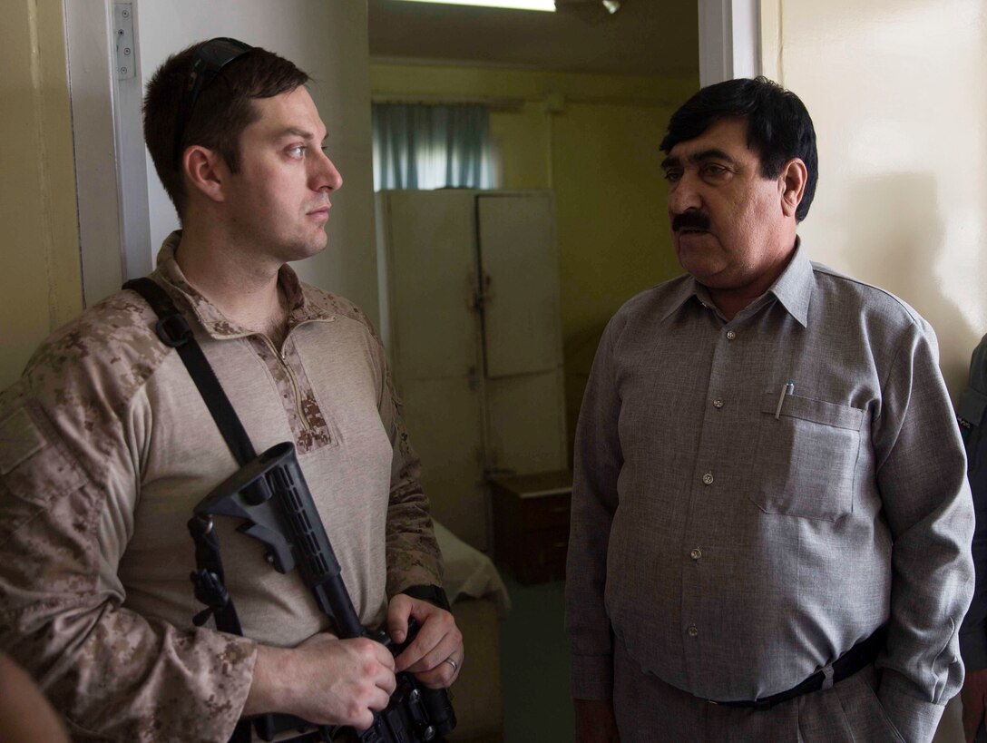 A U.S. Navy Sailor with Task Force Southwest gets a tour from his counterpart of the medical facility at the Helmand Provincial Police Headquarters in Lashkar Gah, Afghanistan, July 9, 2017. This mission provided an opportunity for advisors to meet with their counterparts, review the security posture at the PHQ and ensure that Afghan National Defense and Security Forces have an effective defense of Lashkar Gah. (U.S. Marine Corps photo by Sgt. Justin T. Updegraff)