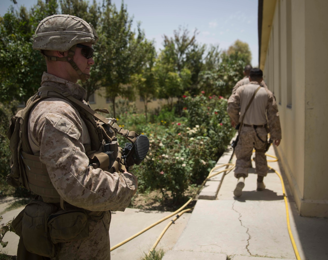 A U.S. Marine with Task Force Southwest provides security for the Marine advisors at the Helmand Provincial Police Headquarters in Lashkar Gah, Afghanistan, July 9, 2017. Task Force Southwest, comprised of approximately 300 Marines and Sailors from II Marine Expeditionary Force, are training, advising and assisting the Afghan National Army 215th Corps and the 505th Zone National Police. (U.S. Marine Corps photo by Sgt. Justin T. Updegraff)