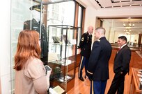 U.S. Army Reserve Lt. Col. Daniel Jaquint, Chief of Staff, 85th Support Command, and Anthony Taylor, right, Public Affairs Specialist, 85th Support Command, receive a tour of the Pritzker Military Museum & Library in Chicago, June 5, 2017. During the tour, the group stopped in front of a uniform worn by Maj. Gen. (retired) William Levine. Levine was appointed Commanding General of the 85th Division (Training) in the late 1960’s. During Levine’s time commanding, the 85th Division (Training) included four brigades that had four battalions made primarily up of drill sergeants and instructors responsible for basic active-duty training. The 85th Support Command since then has shifted its role from basic training to training Soldiers ahead of mobilizations and deployments and supporting administrative requirements to those trainers that ensure Soldiers are certified and ready. Jaquint and Taylor were at Pritzker to discuss the command’s centennial history. The 85th Support Command’s lineage began as the 85th Infantry Division at Camp Custer, Michigan, where the division was nicknamed the “Custer Division,” on Aug. 5, 1917. The Division was deactivated in 1945 following World War II, then later reactivated in Chicago on February 19, 1947 in the U.S. Army Reserve as a training division. The 85th Spt. Cmd. is celebrating its centennial anniversary this year.
(U.S. Army Photo by Sgt. Aaron Berogan/Released)