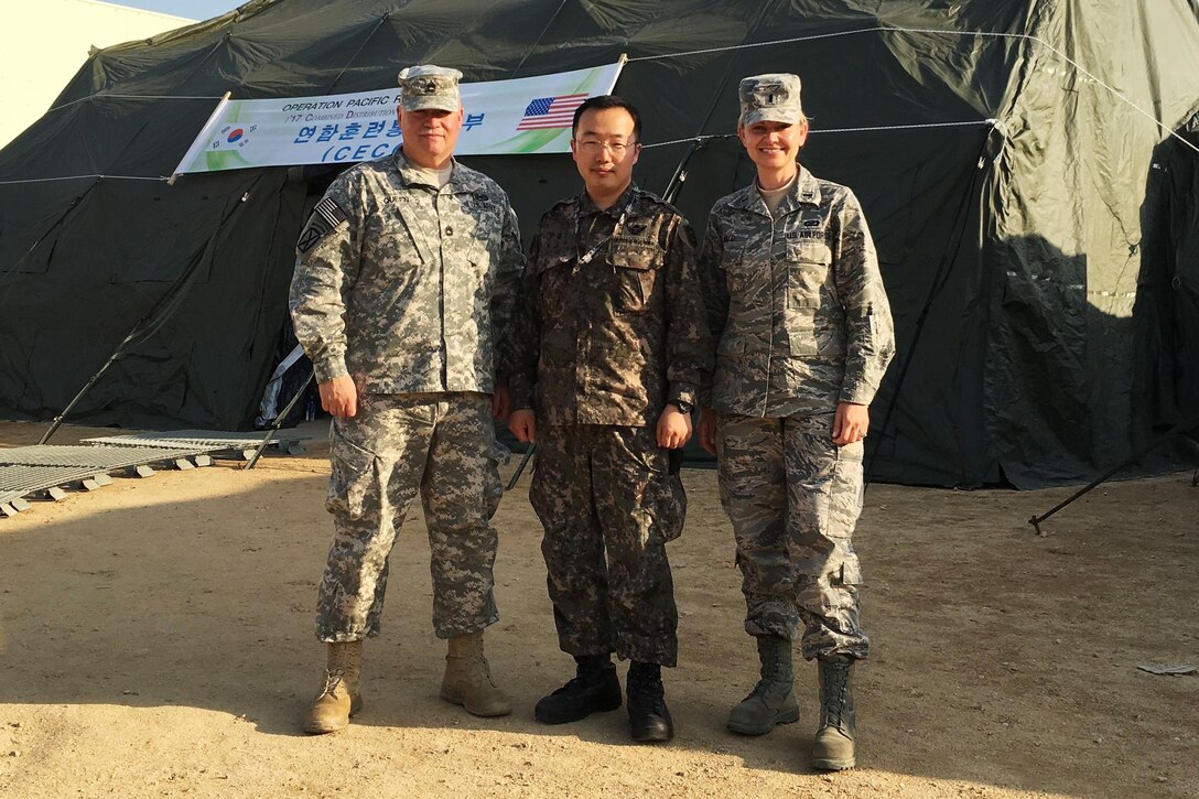 (From left to right) Sergeant 1st Class John Queen, U.S. Forces Korea public affairs, Maj. Hyun Chang Yong, ROK Armed Forces, and Capt. Bari Wald, USFK PA, worked as a team to successfully execute public affairs plans during Operation  Pacific Reach in April 2017. 