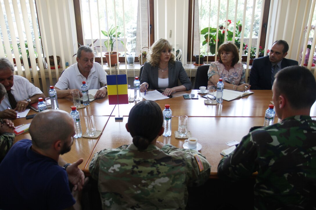Soldiers of 457th Civil Affairs Battalion, 361st Civil Affairs Brigade, meet with the prefect of Ploiești, Romania; July 11, 2017; to prepare for a 2nd Calvary Regiment static display the next day during exercise Saber Guardian (U.S. Army photo by Capt. Jeku Arce, 221st Public Affairs Detachment).
