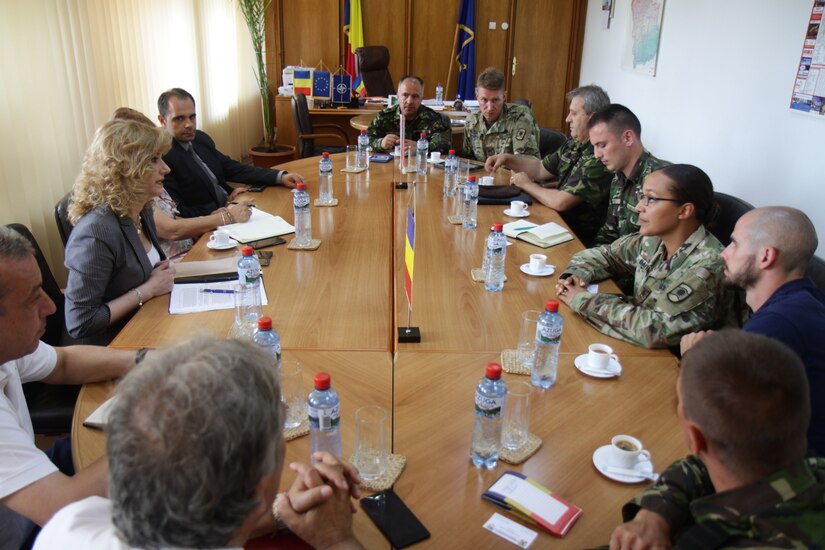 Soldiers of 457th Civil Affairs Battalion, 361st Civil Affairs Brigade, meet with the prefect of Ploiești, Romania; July 11, 2017; to prepare for a 2nd Calvary Regiment static display the next day during exercise Saber Guardian (U.S. Army photo by Capt. Jeku Arce, 221st Public Affairs Detachment).