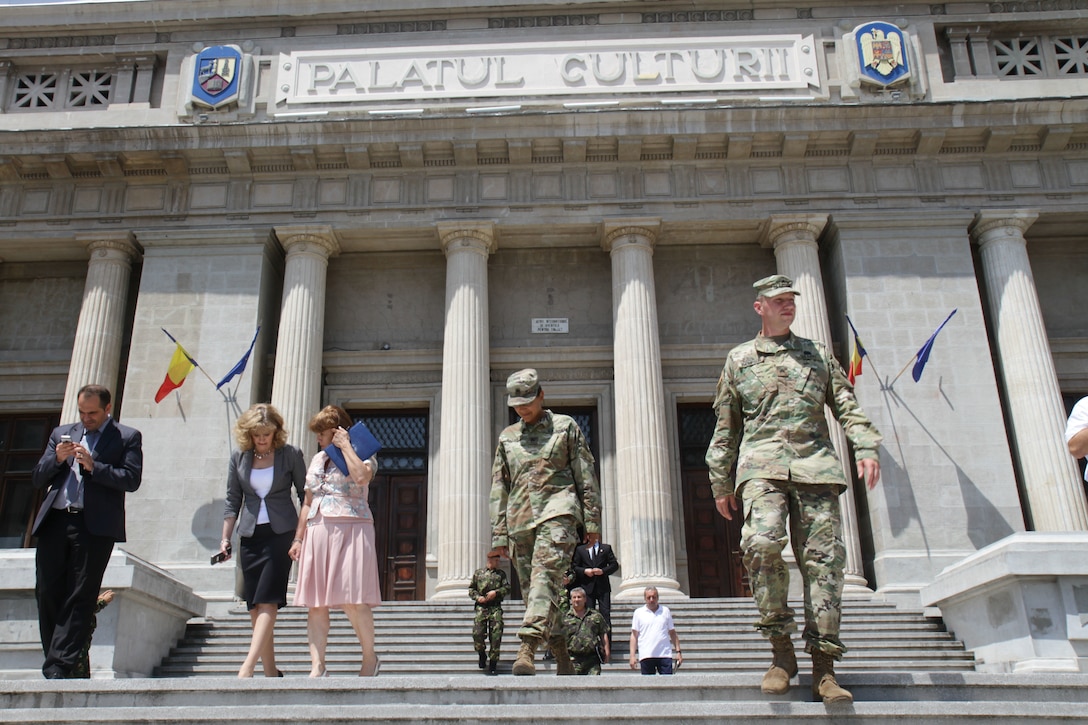 Soldiers of 457th Civil Affairs Battalion, 361st Civil Affairs Brigade, meet with the prefect of Ploiești, Romania; July 11, 2017; to prepare for a 2nd Calvary Regiment static display the next day during exercise Saber Guardian (U.S. Army photo by Capt. Jeku Arce, 221st Public Affairs Detachment).