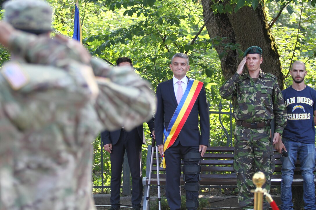U.S. Army Reserve civil affairs soldiers with the 457th Civil Affairs Battalion, 361st Civil Affairs Brigade, host a wreath laying ceremony with 2nd Calvary Regiment and the Romanian Army to honor fallen soldiers during World War II in Romania in Sinaia, Romania during exercise Saber Guardian, July 11, 2017 (U.S. Army photo by Capt. Jeku Arce, 221st Public Affairs Detachment).
