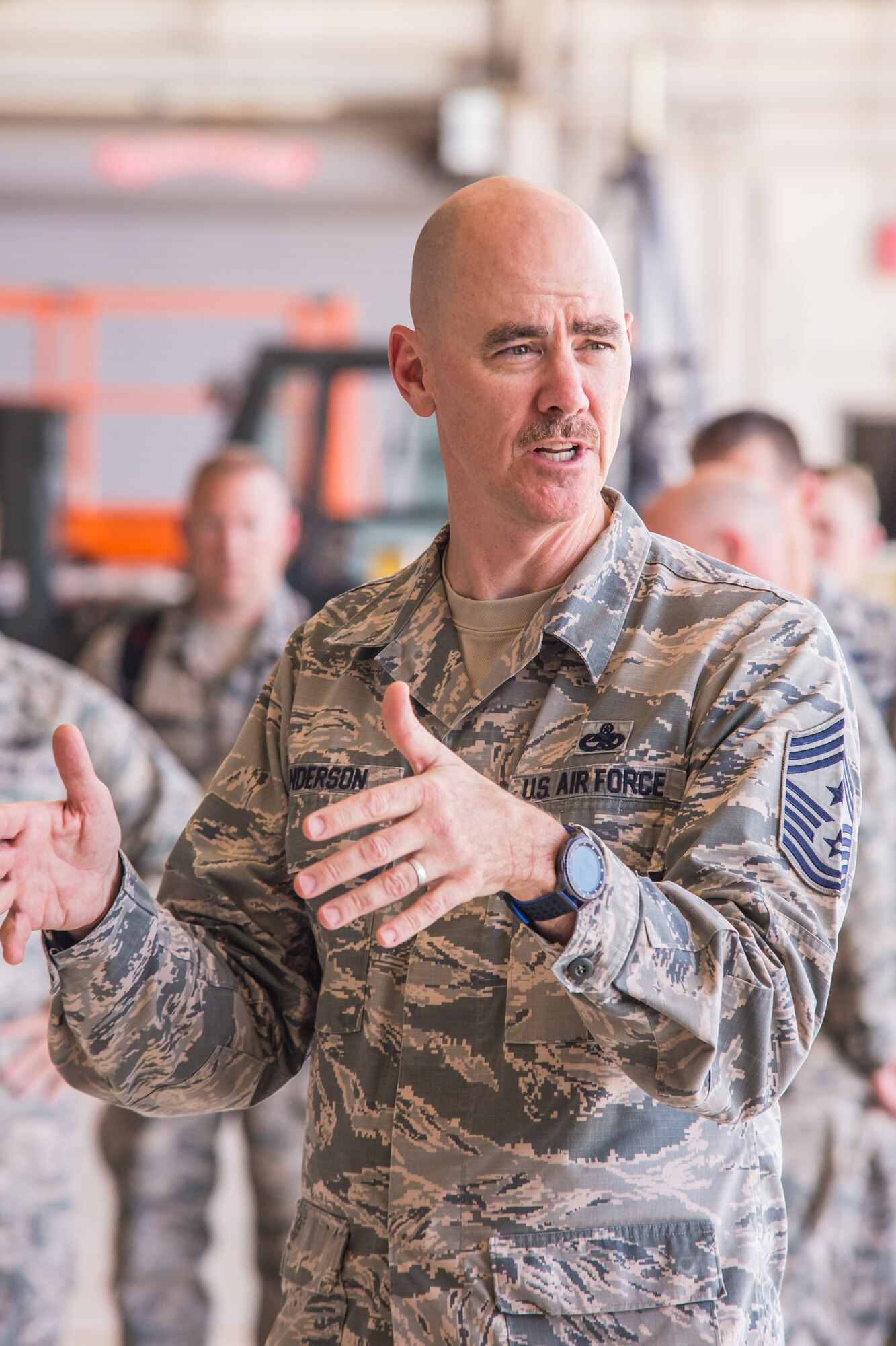 U.S. Air Force Chief Master Sgt. Ronald Anderson, command chief master sergeant of the Air National Guard, and Lt. Gen. Scott Rice (not shown), director of the Air National Guard, conduct a question and answer session with Airmen, during a tour of Rosecrans Air National Guard Base, while visiting the 139th Airlift Wing, Missouri Air National Guard, in St. Joseph, Mo., July 8, 2017. Lt. Gen. Rice and Chief Master Sgt. Anderson, were in the process of visiting units across Missouri. While in St. Joseph, they met with senior leadership and spent time talking with Airmen around the base. (Air National Guard photo by Staff Sgt. Patrick Evenson)