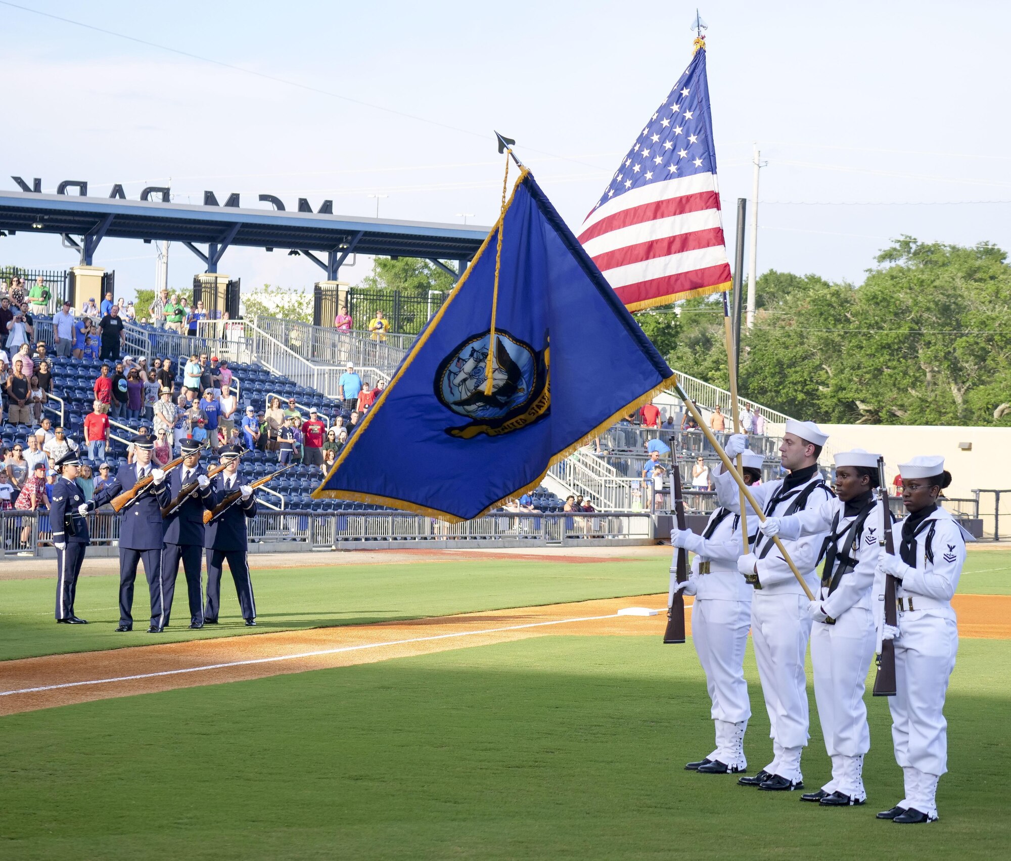 Keesler Air Force Base Honor Guard members perform a firing party during the Biloxi Shuckers Minor League Baseball team’s military appreciation night July 8, 2017, in Biloxi, Miss. The Shuckers recognized and honored service members and their families for the dedication, commitment and sacrifices they make for the nation. 

(U.S. Air Force photo by Capt. David J. Murphy)