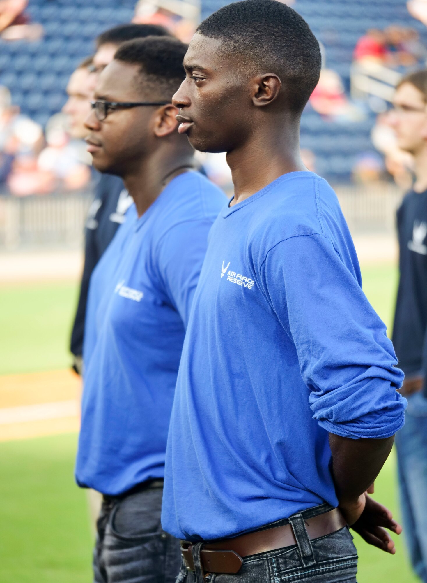 Carlas Hunt stands with other Air Force and Air Force Reserve delayed entry program members prior to reciting the oath of enlistment at the Biloxi Shucker's Military Appreciation Game at MGM Stadium in Biloxi, Miss., July 8, 2017. Hunt was one of 15 other DEP members who were sworn in by Col. Debra Lovette, 81st Training Wing commander. 

(U.S. Air Force photo by Capt. David J. Murphy)