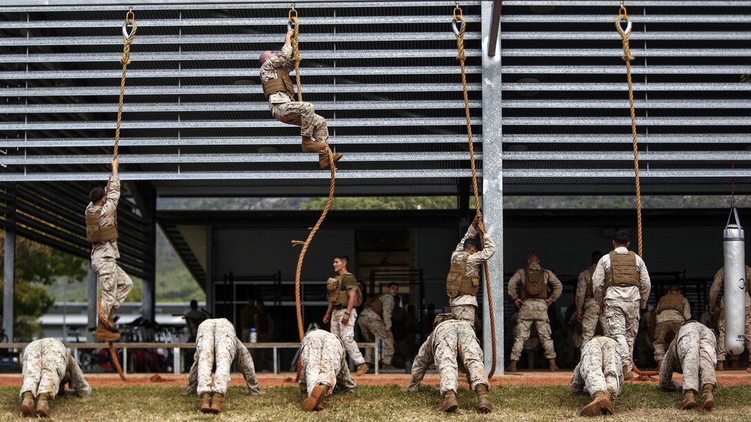 Marines participate in a Marine Corps Martial Arts Program physical training session at Lavarack Barracks, Australia, July 3, 2017. The Marines are assigned to Lima Company, 3rd Battalion, 4th Marine Regiment, 1st Marine Division, Marine Rotational Force Darwin. Marine Corps photo by Cpl. Nathaniel C. Cray