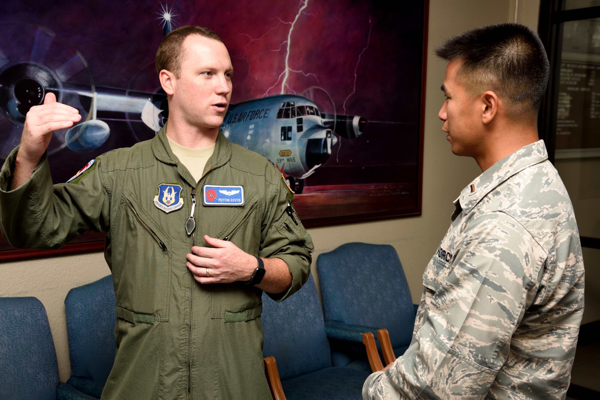 Capt. Peyton Eustis, a pilot with the 53rd Weather Reconnaissance Squadron “Hurricane Hunters”, talks to Air Force chaplain candidate 2nd Lt. Lennox Vu during his visit with other candidates to the 403rd Wing at Keesler Air Force Base, Mississippi, July 8, 2017. The candidates visited with several Air Force wings to get a better feel for how they support the Air Force mission and to meet with the Airmen that could interact with during their careers as chaplains. (U.S. Air Force photo/Tech. Sgt. Ryan Labadens)