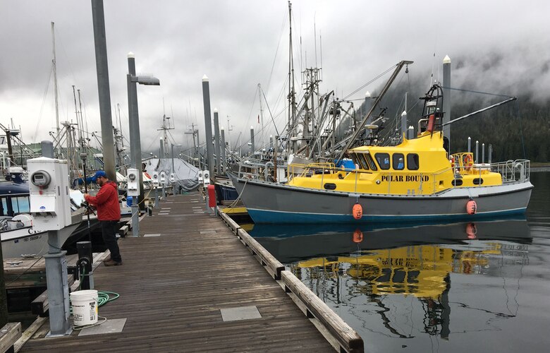 Gerhard Hahn performs a planimetric location survey of a dock at North Harbor in Petersburg, Alaska on June 12, 2017.
