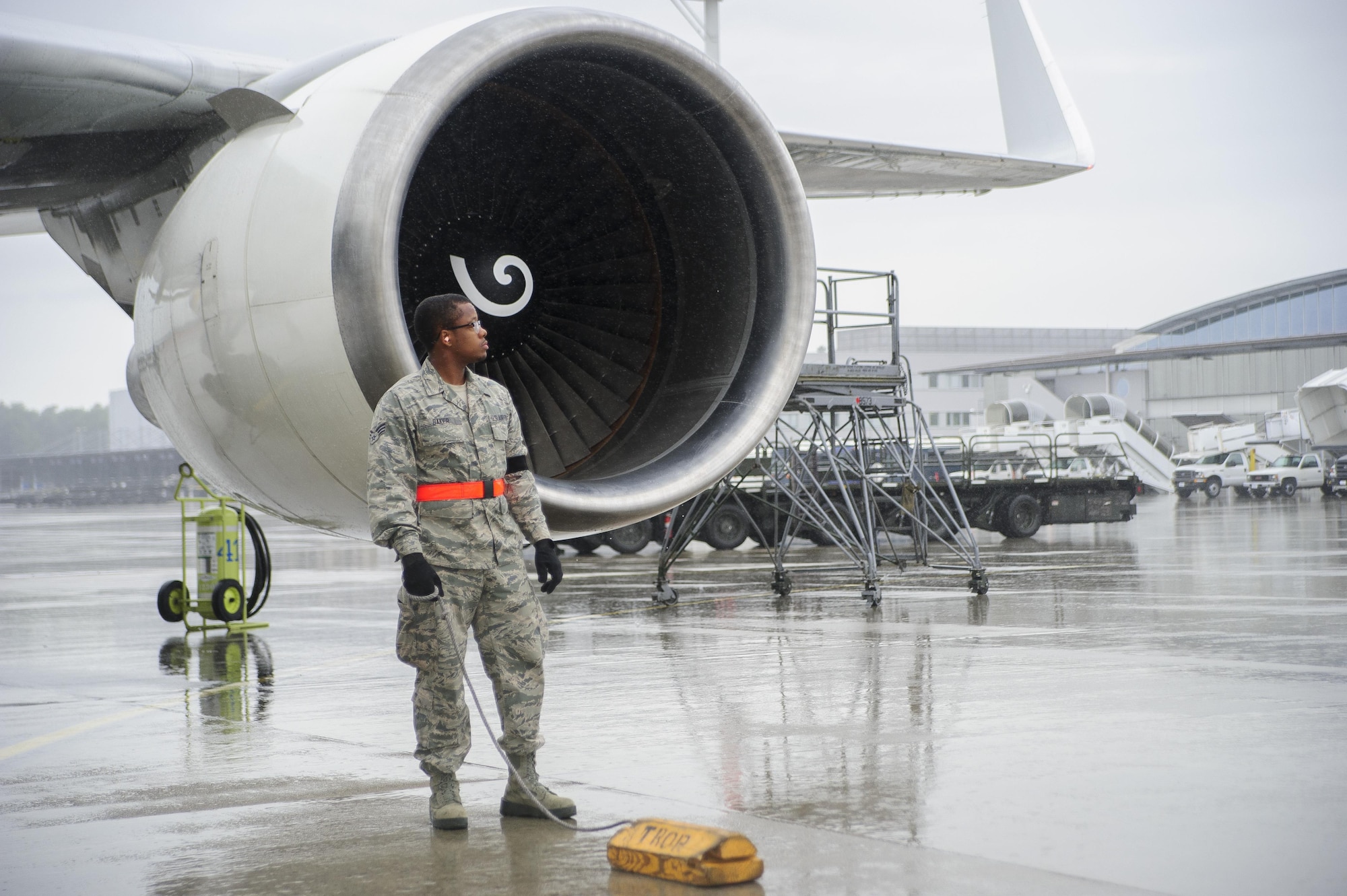 Senior Airman Ronnie Baker, Air Transportation Journeyman with the 81st Aerial Port Squadron out of Joint Base Charleston, S.C., prepares to offload air cargo at Ramstein AB, Germany, July 12, 2017.  Citizen Airmen of the 81st APS performed two weeks of annual training at Ramstein in order to maintain readiness and familiarization with high-volume aerial port operations.  (U.S. Air Force photo by Senior Airman Jonathan Lane)