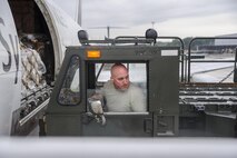 Staff Sgt. Anthony Pokorny, Air Transportation Journeyman with the 81st Aerial Port Squadron out of Joint Base Charleston, S.C., operates a 60K cargo lift while offloading air cargo at Ramstein AB, Germany, July 12, 2017.  Citizen Airmen of the 81st APS performed two weeks of annual training at Ramstein in order to maintain readiness and familiarization with high-volume aerial port operations.  (U.S. Air Force photo by Senior Airman Jonathan Lane)