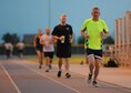 U.S. Air Force Chaplain (Lt. Col.) Larry Fowler, 56th Fighter Wing chaplain, participates in a 1.5 mile run at Luke Air Force Base, Ariz., July 10, 2017. Fowler participated in the run clinic to stay in shape and continually improve his fitness. (U.S. Air Force photo/Airman 1st Class Caleb Worpel)