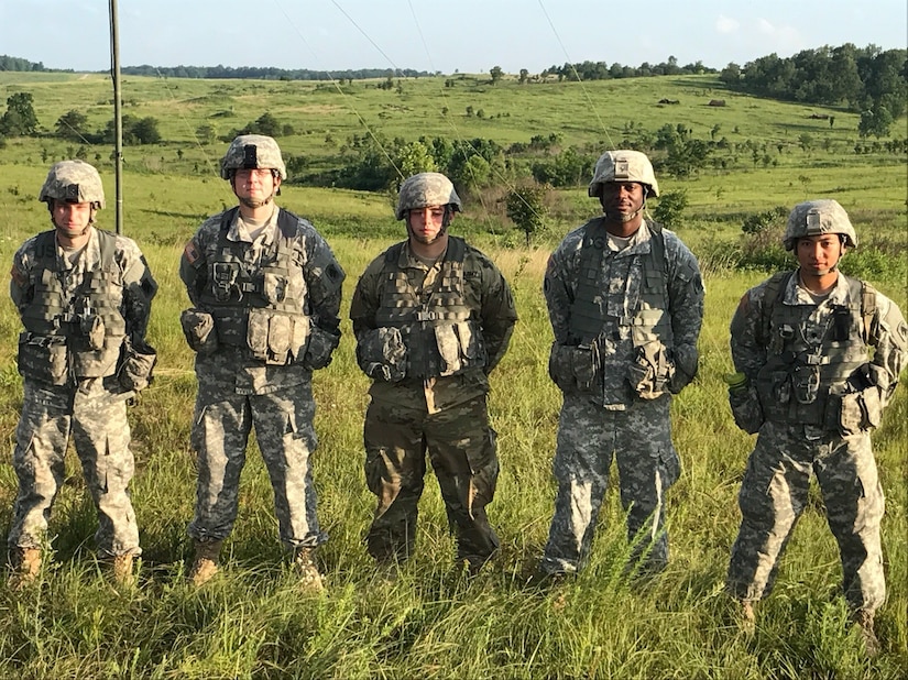 From left, Army Spc. Thomas Murton, Army Spc. Andrew Huff, Army Spc. Dakota Adams, Army Sgt. Terence Daniels and Army Spc. Darren Cruz, all with the 138th Signal Company, assisted in the retransmission shot as well as other communication networks during annual training at Fort Knox, Ky., and the Wendell H. Ford Regional Training Center in Greenville, Ky., June 3-9, 2017. Army photo