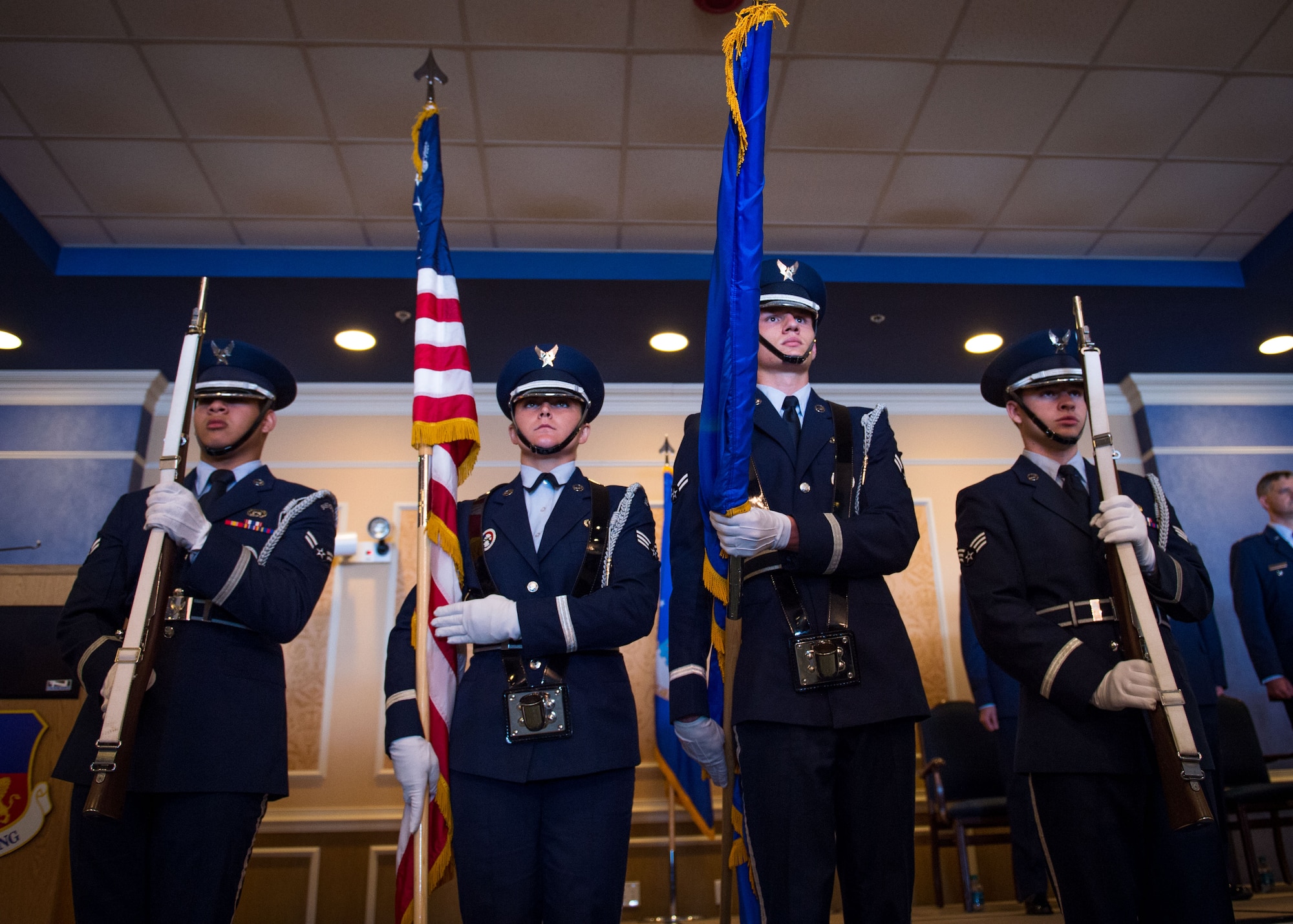 Honor Guard members prepare to present the colors at the 363rd Intelligence, Surveillance and Reconnaissance Wing change of command ceremony July 7, 2017. (U.S. Air Force Photo by Staff Sgt. Areca Bell)