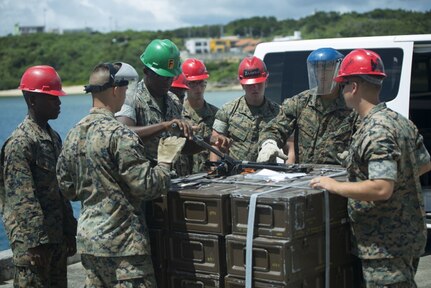 U.S. Marines conduct a movement of unserviceable ammunition from the Ammunition Supply Point on Camp Schwab, Okinawa, Japan to a United States Naval Ship at Tengan Pier, Okinawa. The Marines with Ammunition Company, 3d Supply Battalion, Combat Logistics Regiment 35, 3d Marine Logistics Group, III Marine Expeditionary Force loaded up approximately 130 pallets of ammunition at the ASP to be transported and returned to the Naval Munitions Command on Sasebo Navy Base, Japan, for proper disposal. The experience of a ship-to-shore ammo movement is unique to the Marines with III MEF and benefits their forward deployed capabilities by simulating a realistic scenario that could happen during an operation.
