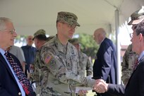 Maj. Gen. Chris R. Gentry, Deputy Commanding General for Support, First Army, shakes hands with Mayor Thomas Hayes, Mayor of Arlington Heights, after the 85th Support Command’s relinquishment of command ceremony, July 9, 2017. The 85th Support Command, partnered with First Army, is made up of 46 Army Reserve battalions, nine brigade support elements, and nearly 4,300 Soldiers and Civilians that spanned across the continental United States and Puerto Rico, and generate combat ready units and Soldiers for the Army that are trained, equipped and lethal to win the nation’s wars. 
(U.S. Army photo by Master Sgt. Anthony L. Taylor)