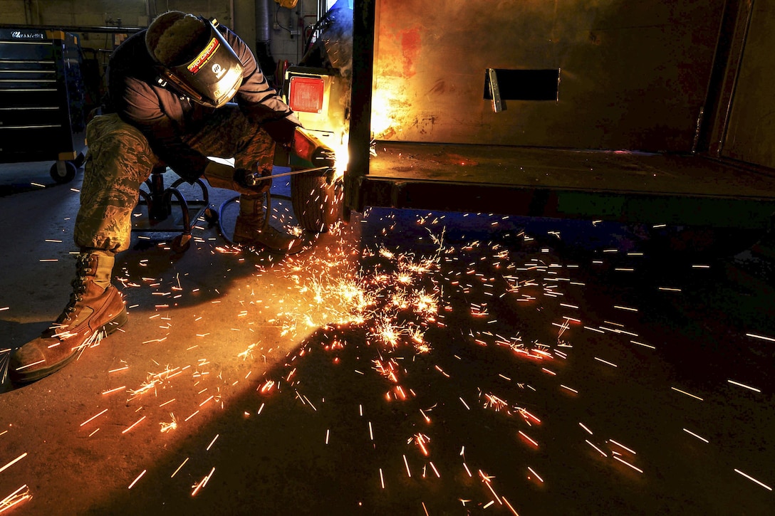 Air Force Staff Sgt. Patrick Peck welds a portable deployment trailer at Shaw Air Force Base, S.C., July 7, 2017. Peck is an aircraft metals technology journeyman assigned to the 20th Equipment Maintenance Squadron. Air Force photo by Senior Airman Christopher Maldonado