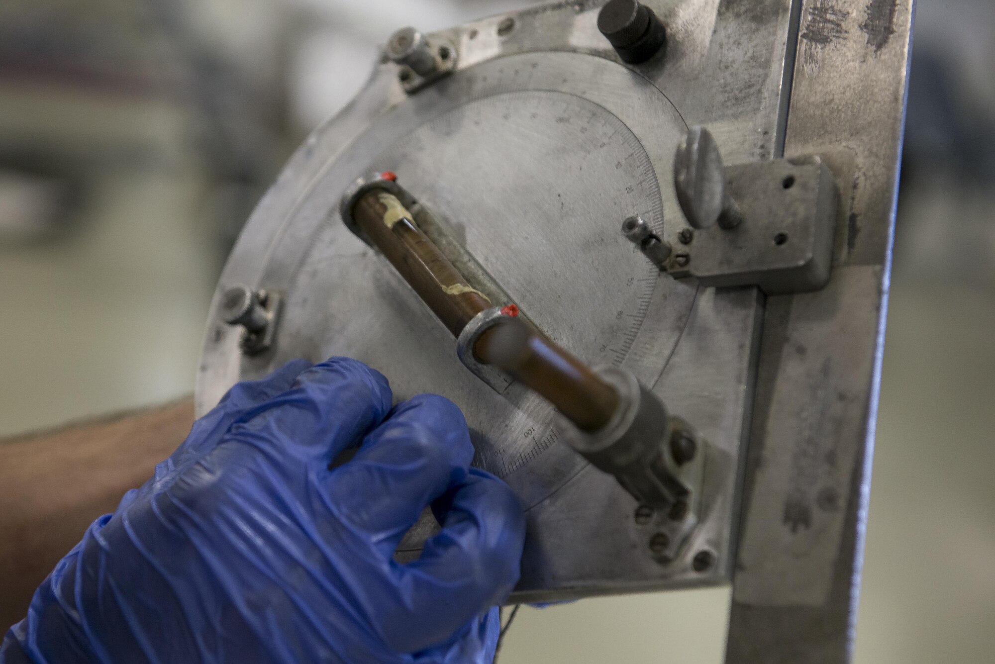 Senior Airman Jacob Lay, 374th Maintenance Squadron aerospace propulsion journeyman, adjusts an angle measuring tool during a MC-130 Talon II propeller test, July 12, 2017, at Yokota Air Base, Japan. This is the last propeller to be built in Yokota’s propulsion flight, which is scheduled to close its doors in 2017; the brand new propeller was put together for a MC-130 Talon II at Kadena Air Base, Japan. (U.S. Air Force photo by Airman 1st Class Donald Hudson)