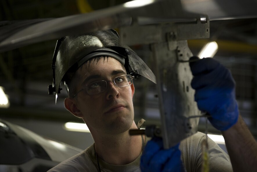 Senior Airman Jacob Lay, 374th Maintenance Squadron aerospace propulsion journeyman, measures a propeller angle during MC-130 Talon II propeller testing, July 12, 2017, at Yokota Air Base, Japan. This is the last propeller to be built in Yokota’s propulsion flight, which is scheduled to close its doors in 2017; the brand new propeller was put together for a MC-130 Talon II at Kadena Air Base, Japan. (U.S. Air Force photo by Airman 1st Class Donald Hudson)