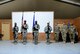 The 407th Air Expeditionary Group base honor guard posted the colors during the 407th Expeditionary Communications Squadron change of command ceremony on July 11, 2017 in Southwest Asia. This ceremony signified the transfer of command between the outgoing commander Lt. Col. Dean Benson and the incoming commander Maj. Charlie Grover to the 407th AEG. (U.S. Air Force Tech. Sgt. Andy M. Kin)