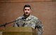 U.S. Air Force Col. John Gonzales, 407th Air Expeditionary Group commander, addresses the 407th AEG, coalition partners, and U.S. Marines during the 407th Expeditionary Communications Squadron change of command ceremony on July 11, 2017 in Southwest Asia. This ceremony signified the transfer of command between the outgoing commander Lt. Col. Dean Benson and the incoming commander Maj. Charlie Grover to the 407th AEG. (U.S. Air Force Tech. Sgt. Andy M. Kin)