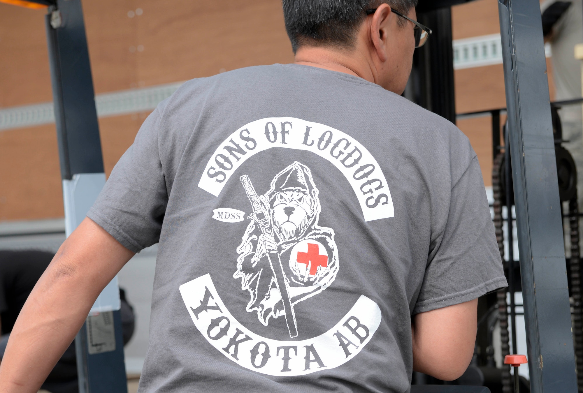 Yutaka Akiba, 374th Medical Support Squadron technician, operates a forklift, June 29, 2017, at Yokota Air Base, Japan. Various medical supplies were shipped via ground transportation to Misawa Air Base, Japan.