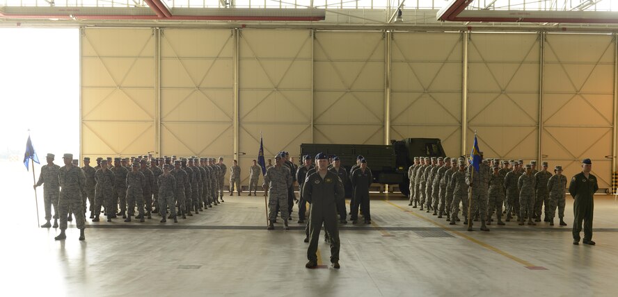 Col. Richard Nelson took command of the 31st Operations Group from Col. Craig Hollis during a change of command ceremony, July 10, 2017, at Aviano Air Base, Italy. Brig. Gen. Lance Landrum, 31st Fighter Wing commander, presided over the event. (U.S. Air Force photo by Tech. Sgt. Andrew Satran)