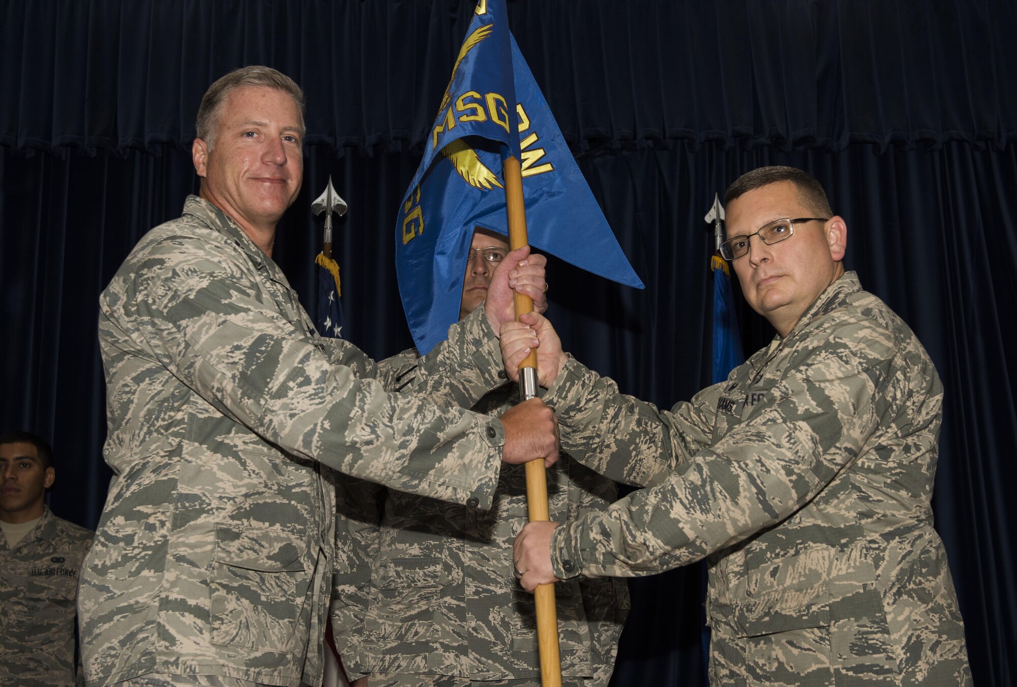 U.S. Air Force Col. David Williams Jr. (right), 39th Mission Support Group incoming commander, assumes command from Col. David Eaglin, 39th Air Base Wing commander, July 13, 2017, at Incirlik Air Base, Turkey. A change of command ceremony is a tradition that represents a formal transfer of authority and responsibility from the outgoing commander to the incoming commander. (U.S. Air Force photo by Airman 1st Class Devin M. Rumbaugh)