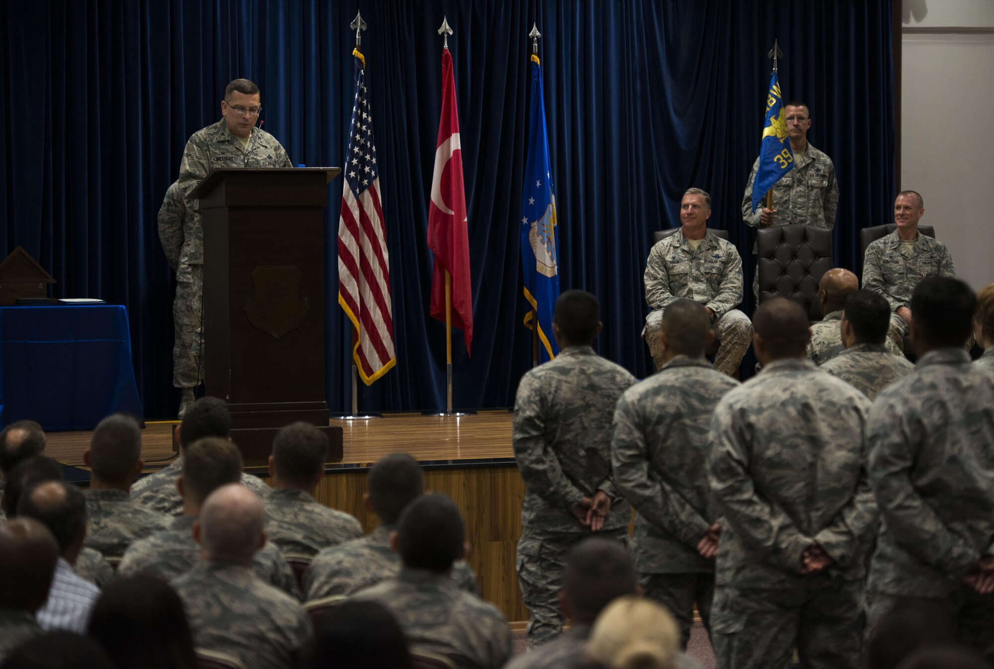 U.S. Air Force Col. David Williams Jr., 39th Mission Support Group incoming commander, speaks with a group of airmen after assuming command, July 13, 2017, at Incirlik Air Base, Turkey. A change of command ceremony is a tradition that represents a formal transfer of authority and responsibility from the outgoing commander to the incoming commander. (U.S. Air Force photo by Airman 1st Class Devin M. Rumbaugh)