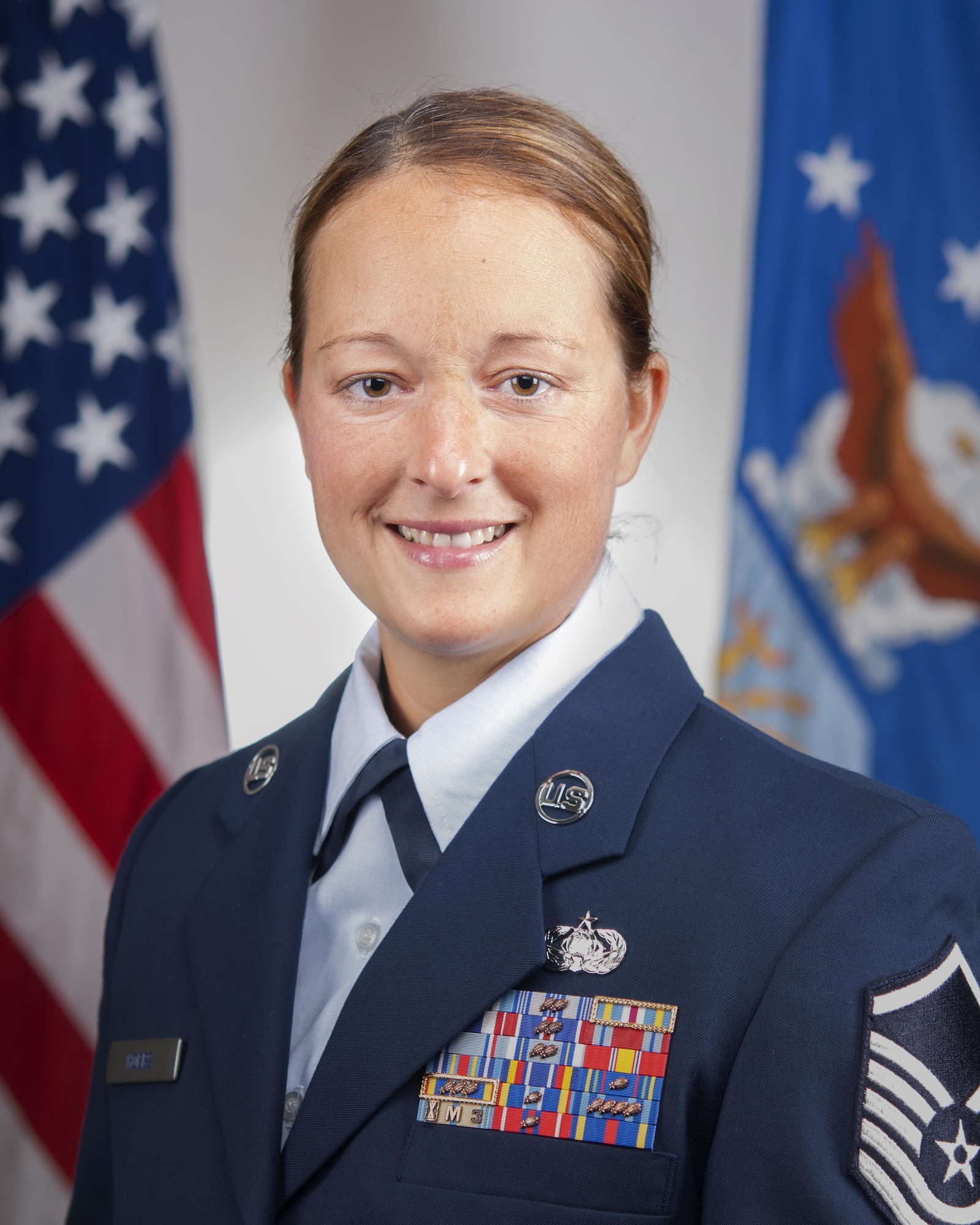 Master Sgt. Lindsay Hobbs, 434th Operations Support Squadron cyber systems surety craftsman, poses for an official photo at Grissom Air Reserve Base, Ind., July 8, 2017. Hobbs was recently selected as 2017 senior noncommissioned officer of the year. (U.S. Air Force photo/Doug Hays)
