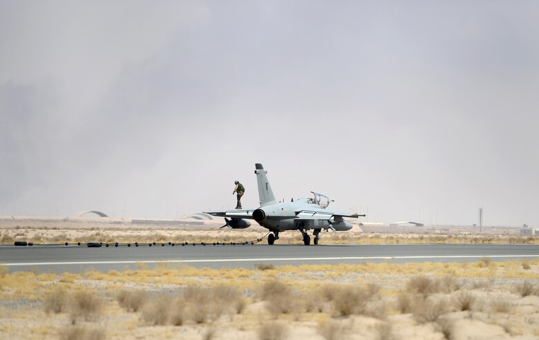 An Italian Air Force (ITAF) AMX A-11 Ghibli aircraft conducts an Aircraft Arresting System engagement during a simulated in-flight emergency in Southwest Asia on July 3, 2017. The AAS allows fighter aircraft to safely stop during an in-flight emergency during takeoff or landing. (U.S. Air Force photo by Tech. Sgt. Andy M. Kin)