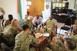 Brig. Gen. Benjamin F. Adams III and State Command Sgt. Maj. David Munden visit with Col. Mohamed Ali Obsieh, the Director General de l’Academie Militare InterArmees for the Djiboutian military in support of the State Partnership Program between the Kentucky National Guard and the nation of Djibouti at Arta-Amia, Djibouti, June 24, 2017.