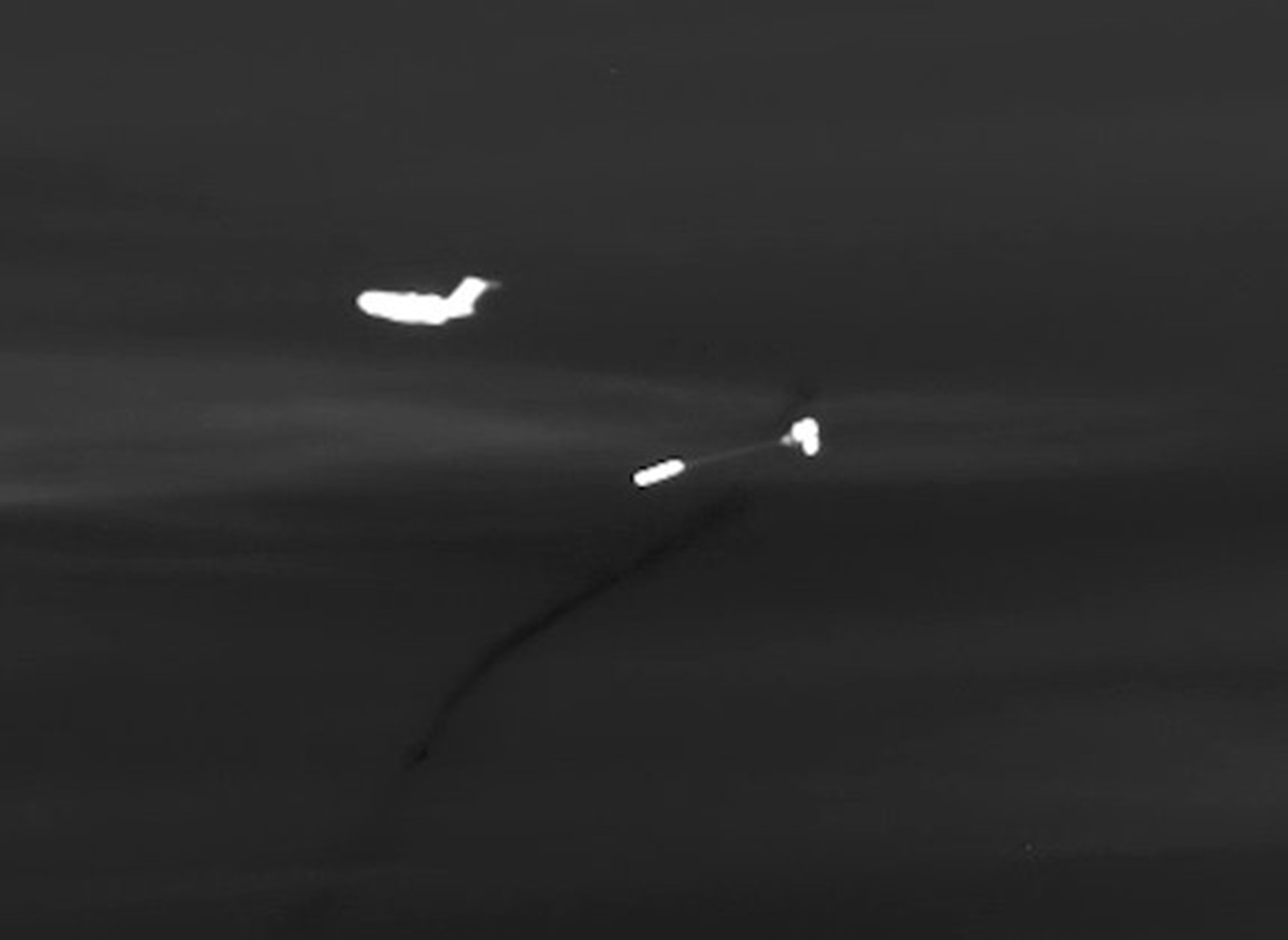 A C-17 assigned to the 418th Flight Test Squadron airdrops Intermediate Range Ballistic Missile target as part of a Missile Defense Agency test. 