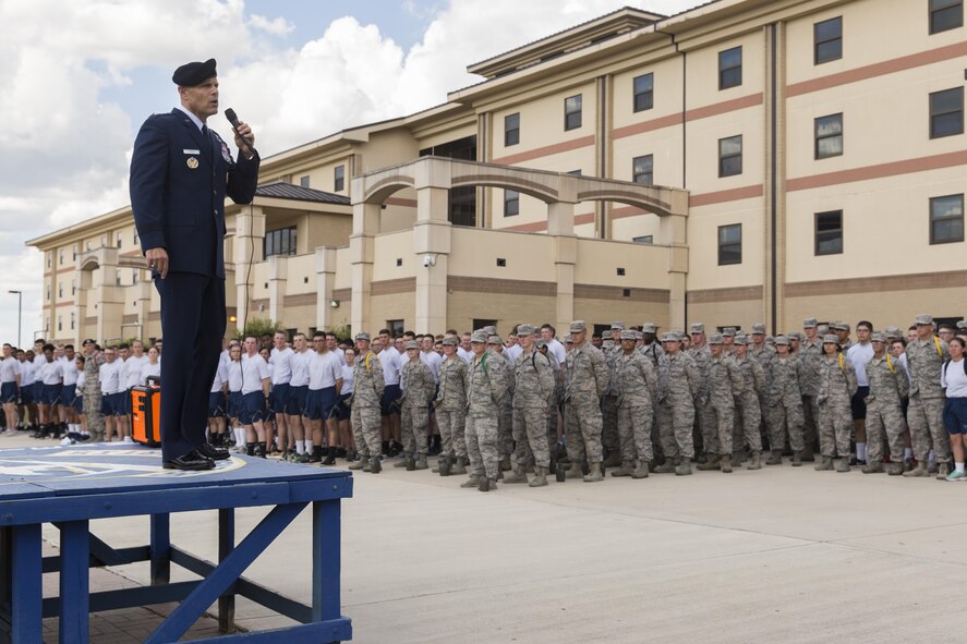 U.S. Air Force Brig. Gen. Bradley D. Spacy, Installation and Mission Support Center commander, addresses the airmen with the 343rd Training Squadron before a demonstration of the U.S. Air Force Honor Guard at Joint Base San Antonio-Lackland, Texas July 7, 2017. Spacy was the commander of the Honor Guard in Fresno, Calif.