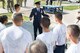 U.S. Air Force Brig. Gen. Bradley D. Spacy, Installation and Mission Support Center commander, talks with airmen from the 343rd Training Squadron after a demonstration of the U.S. Air Force Honor Guard at Joint Base San Antonio-Lackland, Texas July 7, 2017. Spacy was the commander of the Honor Guard in Fresno, Calif.