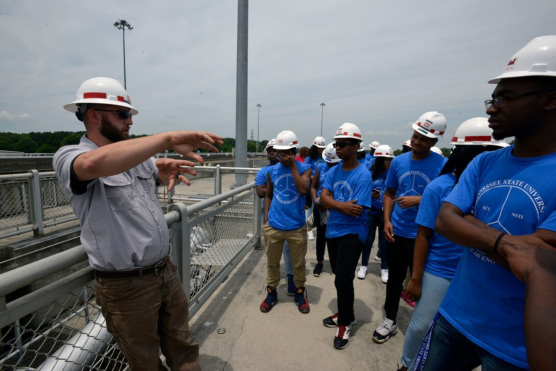 Mark Worley, lockmaster at the Old Hickory Navigation Lock, talks with students touring the lock from the Tennessee State University Engineering Department's four-week National Summer Transportation Institute program on June 21, 2017.