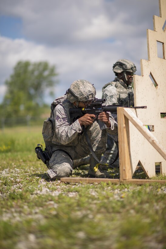 Senior Airmen Nelson Andrade and Lakeya Springfield, 914th Security Forces Squadron, run drills as part of annual training, July 11, 2017, Niagara Falls Air Reserve Station, N.Y. The training focuses on communication and execution of maneuvers, ensuring SFS Airmen are well versed in smoothly and efficiently carrying out procedures in real-world situations. (U.S. Air Force photo by Tech. Sgt. Stephanie Sawyer) 