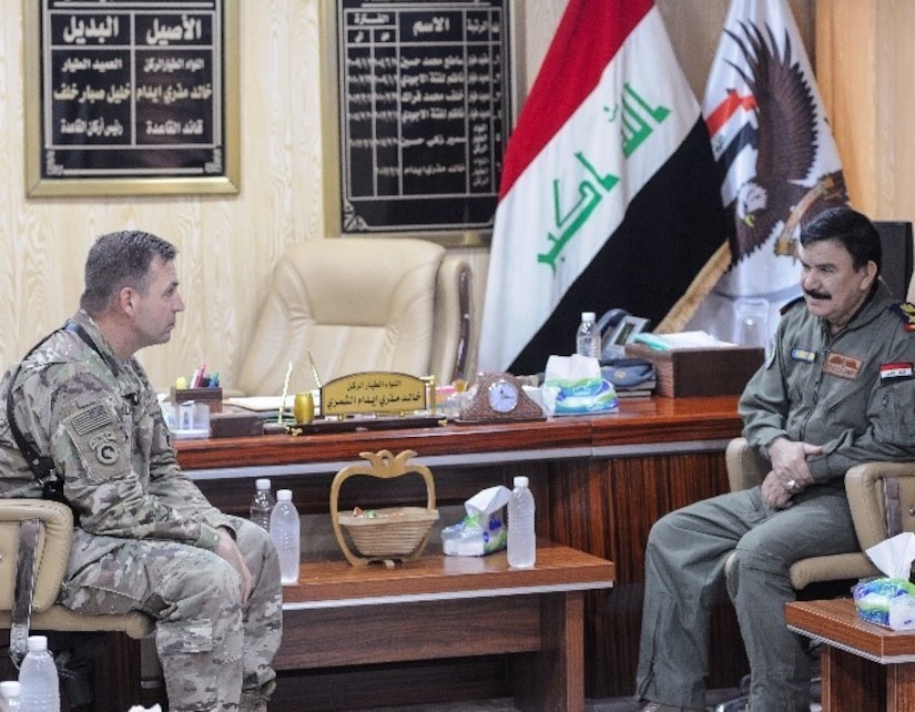 CAMP TAJI, Iraq- U.S. Army Col. Mark Beckler, 29th Combat Aviation Brigade commander, meets with Iraqi Maj. Gen. Khalid Al Shimry, the new aviation base commander of Camp Taji Military Complex, at Camp Taji Military Complex, Iraq, July 6, 2017. The 29th CAB is an Army National Guard unit that is currently deployed in support of Combined Joint Task Force - Operation Inherent Resolve. CJTF-OIR is the global Coalition to defeat ISIS in Syria and Iraq.  (U.S. Army Photo by Capt. Stephen James)