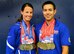 U.S. Air Force Master Sgts. Linn Knight and Kenneth Guinn, explosive ordnance disposal specialists assigned to Tyndall Air Force Base, Fla., pose for a photo with their official Warrior Games medals July 8, 2017 at the University of Illinois at Chicago, Chicago, Ill. The commonalities between the lives of these two warriors are uncanny and extensive; from growing up in the same city and joining the Air Force in the same year, to a traumatic run-in with an IED on the same day. While sharing similar career assignments and progression, Guinn and Knight have forged a friendship built upon on a life of shared experiences. (U.S. Air Force photo by Staff Sgt. Chip Pons)