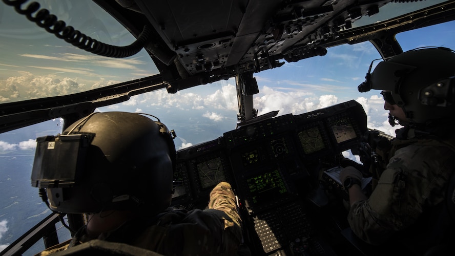 Aircrew with the 8th Special Operations Squadron pilot a CV-22 Osprey tiltrotor aircraft during Total Force Exercise 17-3 above Indiana, July 9, 2017. During the exercise, aircrew with the 8th SOS conducted infiltration and exfiltration of special operations forces and air-to-air refueling missions with a 15th Special Operations Squadron MC-130H Combat Talon II. (U.S. Air Force photo by Airman 1st Class Joseph Pick)
