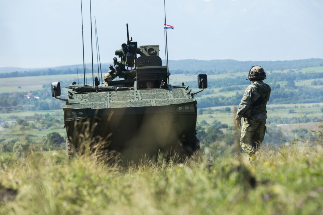 Soldiers of the Croatian armed forces maneuver their armored vehicles during Getica Saber 2017 in Cincu, Romania, July 10, 2017. Getica Saber 2017 is a U.S.-led fire support coordination exercise and combined arms live fire exercise that incorporates six allied and partner nations with more than 4,000 soldiers. Getica Saber 2017 runs concurrent with Saber Guardian 2017, a U.S. Army Europe-led, multinational exercise that spans across Bulgaria, Hungary and Romania with over 25,000 service members from 22 Allied and partner nations. Army photo by Spc. Antonio Lewis