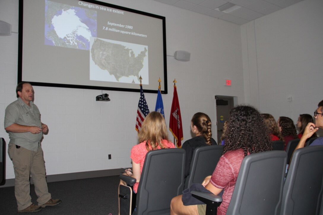 Research physical scientist Bruce Elder shares polar engineering research issues with Advanced Studies Program students from St. Paul’s School in Concord, New Hampshire, during a field trip to the U.S. Army Cold Regions Research Laboratory on July 12.