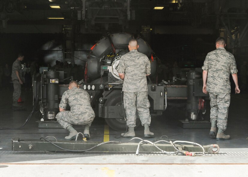 Members of the 705th Munitions Squadron Global Strike Challenge team inspect a rotary launcher at Minot Air Force Base, N.D., June 30, 2017. The common strategic rotary launcher houses cruise missiles on the B-52H Stratofortress. (U.S. Air Force photo by Airman 1st Class Jessica Weissman)