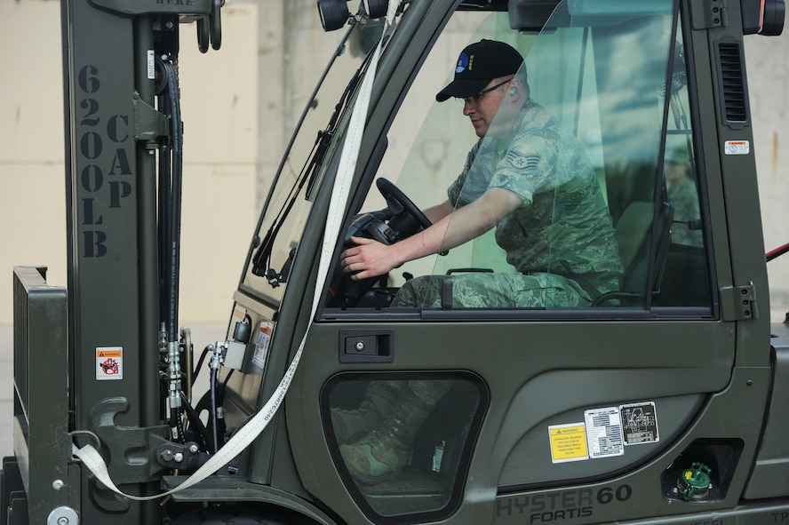 Staff Sgt. Erich White, 705th Munitions Squadron re-entry systems and re-entry vehicles team member, turns on a forklift at Minot Air Force Base, N.D., June 30, 2017. The 705th MUNS 2017 Global Strike Challenge team completed a “forklift rodeo” by maneuvering an asset with a forklift. (U.S. Air Force photo by Airman 1st Class Jessica Weissman)