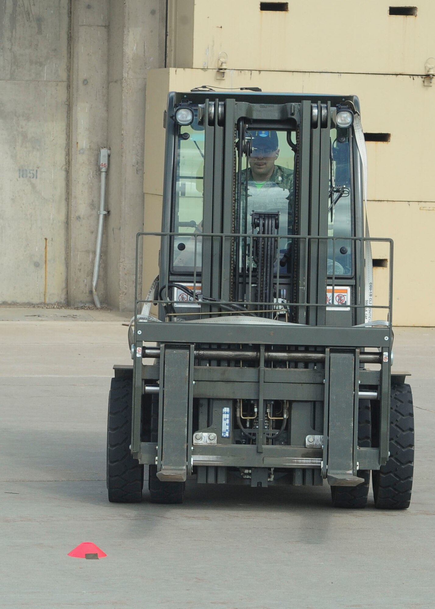 Staff Sgt. Erich White, 705th Munitions Squadron re-entry systems and re-entry vehicles team member, drives a forklift at Minot Air Force Base, N.D., June 30, 2017. The 705th MUNS 2017 Global Strike Challenge team completed a “forklift rodeo” by maneuvering an asset with a forklift. (U.S. Air Force photo by Airman 1st Class Jessica Weissman)