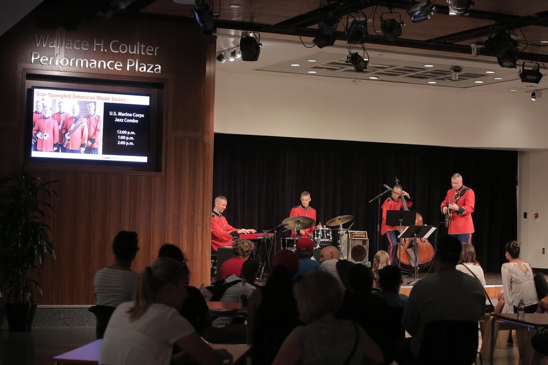 On July 13, 2017, a Marine Jazz Combo performed at the National Museum of American History's Wallace H. Coulter Performance Plaza as part of the Star-Spangled American Music Series. (U.S. Marine Corps photo by Master Sgt. Amanda Simmons/released)