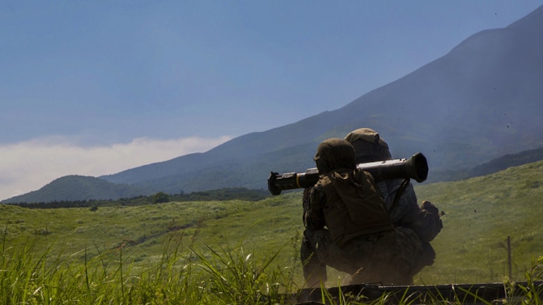 U.S. Marine Corps Lance Cpl. Sarah Kelly, a small arms repair technician with Marine Wing Support Squadron 171, based out of Marine Corps Air Station Iwakuni, shoots an M136E1 AT4-CS confined spaces light anti-armor weapon during phase two of Eagle Wrath 2017 at Combined Arms Training Center Camp Fuji, Japan, July 10, 2017. Phase two consisted of conducting live-fire training exercises to give MWSS-171 the knowledge and confidence to utilize weapons systems effectively in a deployed environment.